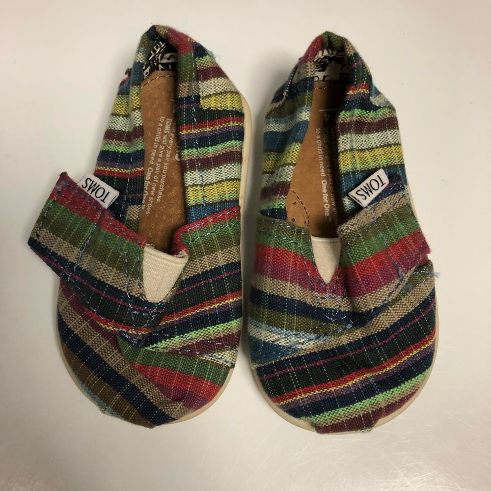 TOMS multi colored striped shoes